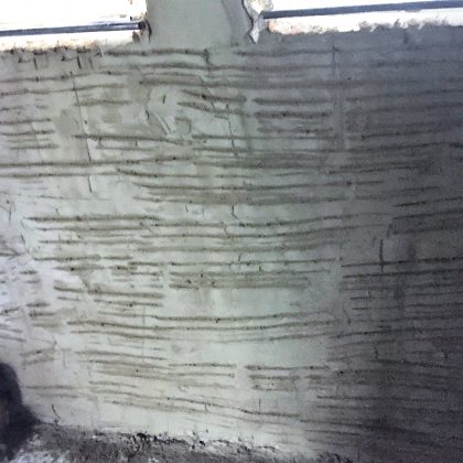 Damp proofing base coat applied